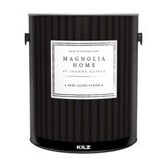 a black and white bucket with the words magnolia home on it