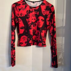 Women’s Red And Black Fashion Top . Never Worn Fitted Red Top In Edgy Style, Trendy Printed Red Tops, Trendy Red Printed Top, Edgy Red Tops For Fall, Edgy Red Top For Night Out, Edgy Red Top With Graphic Print, Edgy Red Graphic Print Top, Bold Red Tops For Spring, Trendy Red Tops For Night Out