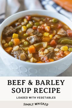 beef and barley soup recipe with vegetables in a white bowl