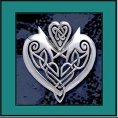 a silver heart with two hearts in the middle and an arrow at the center on a blue background