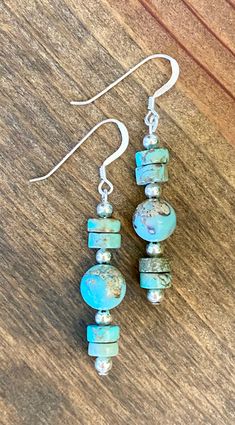 The Blue Stone Earrings are a handmade beaded gift for her, featuring fun shapes of jasper. With sterling silver hook dangles, these earrings are perfect for everyday wear or any special occasion. 𝗗𝗘𝗧𝗔𝗜𝗟𝗦 ✨ Materials: Natural howlite turqoise, sterling silver beads, blue sea sediment jasper, sterling silver hooks ✨ Colors: Blues, gold-browns, silver ✨ Size: Almost 2 inches approx.  See picture for reference ✨ Colors may appear different on different screens ✨ ALL JEWELRY COMES WITH GIFT B Stone Bead Earrings, Unique Diy Earrings Ideas, Handmade Earrings Ideas, Mango Earrings, Diy Earrings Dangle, Navajo Silver Jewelry, Earrings Handmade Beaded, Handmade Turquoise Earrings, Pearl Teardrop Earrings