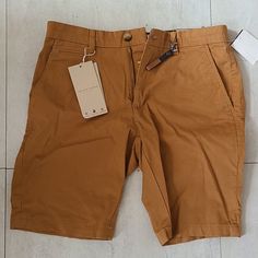 Nwt Denim & Flower Tan Shorts Size 29/36 Fitted Brown Cotton Shorts, Brown Cotton Shorts For Spring, Brown Jean Shorts For Spring, Spring Brown Jean Shorts, Casual Brown Mid-rise Shorts, Brown Jean Shorts With Pockets For Summer, Flower Orange, Tan Shorts, Denim Flowers