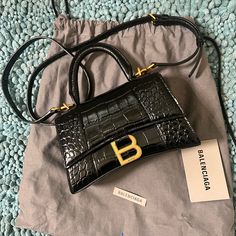 Brand New With Booklets And Dust Bag. No Receipts, Can’t Find It. Size Is Extra Small Color Black And Gold. Currently Sold In Stores For $2800+ Tax. Balenciaga Hourglass Bag, Hourglass Bag, Bags Balenciaga, Balenciaga Tote, Balenciaga Handbags, Everyday Handbag, Mary Kate, Balenciaga Bag, Lambskin Leather