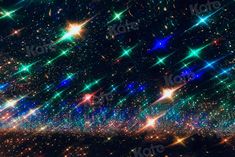 an abstract background with stars and sparkles in the night sky, as seen from space