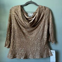 Adrianna Papell Womens Sequin Cowl Neck Size P14 Color Beige/Creamy Beautiful Top With All Exclusive Of Ornamentation, Ruffles In The Bottom Made In India Shell 100%Silk Questions? Let Know! All The Items Are Pet And Smoke Free Home! Offers Welcome! Bundle 3 Or More Items To Get 10% Discount! Shipping Within 1-2 Days! Silk Shell Top, Elegant Embellished Holiday Blouse, Elegant Embellished Beige Tops, Elegant Beige Embellished Tops, Fitted Embellished Beige Blouse, Fitted Beige Embellished Blouse, Elegant Beige Sequined Tops, Elegant Beige Top For Festive Occasions, Dark Green Blouse