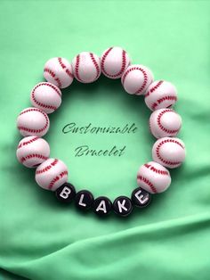 a bracelet made out of baseball beads with the word blaxe on it