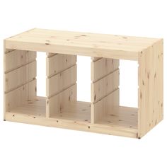 a wooden shelf with multiple compartments on each side