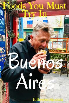 a man is eating food in front of a sign that reads, foods you must try in buenos aires