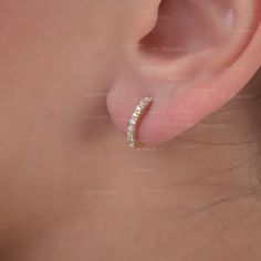 This earring is made with real si clarity g-h color diamond and solid 14k yellow/rose/white * SKU: SGE00739 * Made to Order * Gold Purity: 14K Solid Yellow Gold (stamped) * Custom Gold Color: Rose Gold, Yellow Gold, White Gold * Custom Gold Purity: 9K/14K/18K (Charges Apply) * Diamond 100% Genuine Diamond * Diamond Weight: 0.15 Ct. * Diamond Color: G-H * Diamond Clarity: SI1- SI2 * Diamond Cut: Brilliant Cut (Excellent) Product Measurement Earrings Sizes:- 8 mm / 10 mm / 12 mm (Inner Diameter) ✦ Minimalist Wedding Earrings, Huggie Hoop Earrings, Diamond Color, Micro Pave, Yellow Roses, Diamond Clarity, Yellow Rose, Solid Yellow, Wedding Earrings