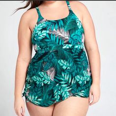 New With Tag One Piece Swim Suit With Ruched Sides And Convertible Straps. Features Lighty Padded Bra Top , No Underwire , Scoop Neck And Semi Sheer Bottom. Green One-piece Tropical Tankini, Green Tropical Style One-piece Tankini, Green One-piece Tankini With Adjustable Straps, Green Tankini With Built-in Bra For Vacation, Casual Ruched Tankini For Swimming, Casual Ruched Tankini For Vacation, Casual Sleeveless Ruched Tankini, Casual Ruched Sleeveless Tankini, Green Summer Tankini With Built-in Bra