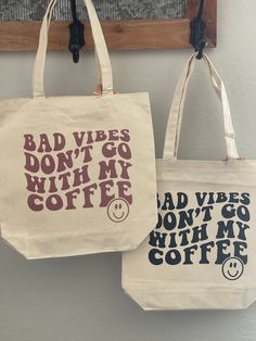 Make statement with the "Bad Vibes Don't Go With My Coffee Tote Bag =)". This trendy bag features a sleek two-tone design and is made with durable canvas material that is sure to last you for years to come. Show off a fresh look and make sure your coffee arrives free of bad vibes. Coffee Tote Bag, Bad Vibes, My Coffee, Fresh Look, The Bad, Canvas Material, Two Tone, Sleek, Tote Bag