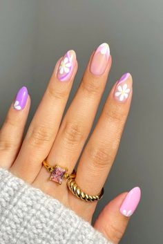 Celebrate the arrival of spring with this stunning combination of gold rings and vibrant floral nail art. The beautiful white flowers and purple pink nails perfectly complement the gold ring, creating a look that is both elegant and playful! 🌸 #springnails #nails2023trends #goldjewelry #easternails #springnailideas #floralnails #goldrings Purple Pink Nails, Summer Nails Bright, Purple And Pink Nails, Old Money Nails, Money Nails, Textured Gold Ring, Nails Bright, Fun Summer Nails, Gel Remover