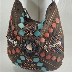 Thank You For Clicking Our Charm Luck Brown Canvas Western Shoulder Slouch Bag Purse Turquoise Beaded New New, Unused Canvas Slouch Bag With Lots Of Western Style And Flair! The Seed Bead, Applied Stone And Metal Stud Work Is So Eye-Catching And Unique! Think Yellowstone! -Braided Real Leather Strap -Wonderfully Intricate Bead, Stone And Stud Work -Dual Zipper Closure With Charm And Luck Spell-Out Metal Pulls. -Such A Pretty Pink Inside Lining With Zipper Pocket And Double Credit Card Slip Pocke Summer Beaded Brown Shoulder Bag, Summer Brown Beaded Shoulder Bag, Beaded Brown Shoulder Bag For Vacation, Beaded Brown Shoulder Bag For The Beach, Bohemian Beaded Shoulder Bag For Vacation, Bohemian Embellished Bags For Vacation, Bohemian Embellished Bag For Vacation, Beaded Brown Shoulder Bag For Travel, Travel Brown Beaded Shoulder Bag