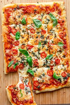 the pizza is cut into slices and ready to be put in the oven on the cutting board