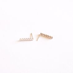 Simple enough for the woman on-the-go. These Elegant long circle bar studs are soldered with solid 10mm sterling silver posts and are perfect for any occasion. Earring backs and ear nuts are also solid sterling silver. + Sterling Silver or Black Oxidized Sterling Silver Rectangle stud measuring 18mm by 3mm + Matte Finish + Earring Posts are 20ga Solid Sterling Silver 10mm long + Sterling Silver Butterfly Backs + Packaged in a Kraft Box + Listing is for a pair Silver Oxidized is sterling silver w Everyday White Gold Sterling Silver Ear Climbers, Everyday Minimalist Nickel-free Ear Climbers, Minimalist Nickel-free Ear Climbers For Everyday, Minimalist White Gold Sterling Silver Ear Climbers, Minimalist Pierced Sterling Silver Ear Climbers, Minimalist Sterling Silver Nickel-free Ear Climbers, Everyday Sterling Silver Ear Climbers, Minimalist Silver Pierced Ear Climbers, Silver Minimalist Pierced Ear Climbers