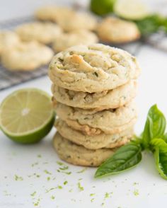 a stack of cookies next to a lime