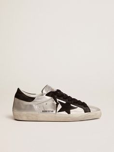 The iconic design of the Super-Star sneakers is updated every season with exclusive finishes and combinations of innovative materials. This style features a silver leather upper with contrasting black leather inserts. Golden Family, Exclusive Sneakers, Stockholm Fashion, Star Sneakers, Super Star, Golden Goose, Mini Me, Golden Goose Sneaker, Luxury Handbags