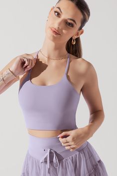 Whether your movement-of-the-day includes sunrise salutations or midday soirées, this crop top adds a touch of comfort and chic to every occasion. Compression Level: Performance Level: Athleisure Tops With Built-in Bra For Relaxation, Spring Relaxation Tops Bra Friendly, Spring Tops For Relaxation, Bra Friendly, Bra-friendly Yoga Crop Tops, Spring Crop Top With Light Support, Lavender Summer Activewear For Gym, Lavender Activewear For Gym In Summer, Casual Solid Crop Top For Pilates, Casual Solid Color Crop Top For Pilates