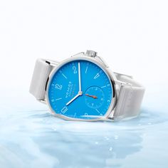 Life's a beach with Ahoi siren blue. How have you made a splash today? Nomos Watch, Sports Watch, Glass Domes, Neon Orange, Automatic Watch, Samsung Gear Watch, Bright Blue, Omega Watch, Leather Wallet