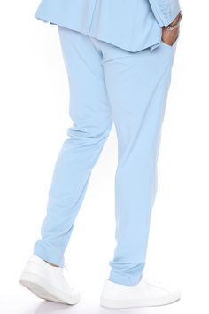 Model Height: 6'2 Large - Waste size 34 Big & Tall: Height 6'3 - Waist Size 42 Available In Light Blue. Button Closure Zip Fly Side Hand Pockets Back Pockets Slim Fit Shell: 65% Polyester 33% Viscose 2% Elastane Lining: 100% Polyester Inseam is 33 , can be tailored Pair with The Modern Stretch Suit Jacket Imported | Mens The Modern Stretch Slim Trouser in Light Blue size 42 by Fashion Nova Blue Tapered Leg Pants With Button Closure, Stretch Blue Bottoms With Button Closure, Blue Stretch Bottoms With Button Closure, Blue Tapered Leg Bottoms With Button Closure, Blue Chinos For Spring Workwear, Spring Blue Chinos For Workwear, Spring Workwear Blue Chinos, Light Blue Fashion, Tall Height