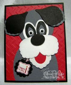 a close up of a card with a dog on it's face and a tag