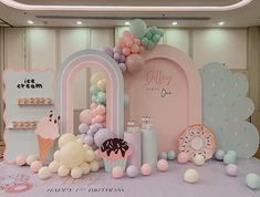 an ice cream themed birthday party with balloons and decorations