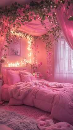 a bedroom decorated in pink and white with lights on the ceiling, bedding and curtains