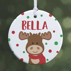 a personalized christmas ornament with a moose on it's face and name