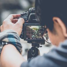 a man is taking pictures with his camera