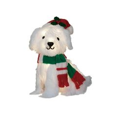 a white stuffed dog wearing a green and red scarf on it's back legs