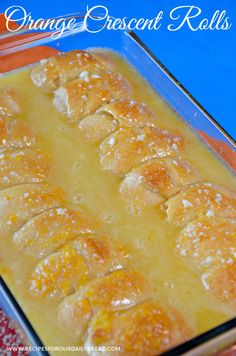 orange crescent rolls in a glass baking dish on an orange and blue tablecloth with text overlay