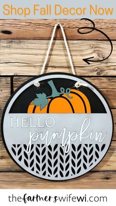 a sign that says, shop fall decor now hello pumpkin the farmer's wife