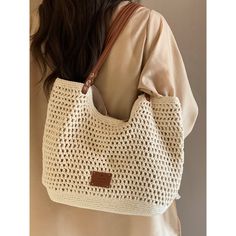 Natural beige colored woven tote bag. It has a distinctive soft texture and is accented with a brown leather strap. Items that will enhance your vacation mood. The atmosphere is casual and relaxed. 
 
 
 Size 
 
 
 FREE size 
 
 Height: 24cm 
 Width: 39cm 
 Depth: 9cm 
 
 
 
 
 
 Material 
 
 Polyester 
 Synthetic leather Colored Weave, Women Style Casual, Holiday Bag, Woven Tote Bag, Fabric Structure, Fancy Bags, Brown Leather Strap, Types Of Bags, Types Of Bag