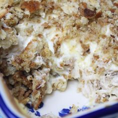 a blue and white plate with food on it