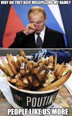 a man in a suit and tie sitting at a table with french fries on it