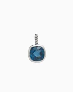 The Square Stone Pendant features a faceted London blue topaz stone set in sterling silver with a unique petroglyph texture. Take notice of the twisted detailing on the bail which adds a playful touch. Pair with your favorite chain, sold separately. Metal: Sterling silver Stone: London blue topaz Dimensions: 23mm x 14mm Stone Size: 12mm x 12mm Style #: P246LB Modern Topaz Birthstone Jewelry, Modern White Gold Topaz Jewelry, White Gold Topaz Birthstone Jewelry, Polished Sterling Silver Gemstones, Sterling Silver Polished Gemstones For Fine Jewelry, Polished Topaz Fine Jewelry, Fine Jewelry In Polished Topaz, Fine Jewelry With Polished Topaz, Fine Jewelry With Faceted Topaz