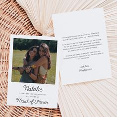 two women hugging each other in front of a photo on a wicker basket with the words matale next to it