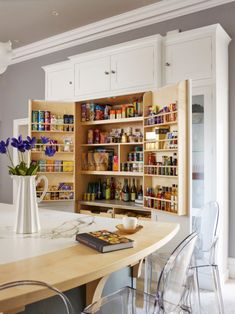 the kitchen is clean and ready to be used as a storage area for food items