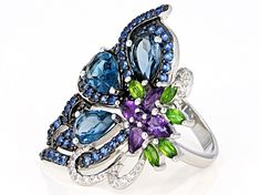 3.28ctw pear shape London blue topaz with .63ctw pear shape and .02ct round African amethyst, .36ctw marquise Russian chrome diopside, .94ctw round lab created blue spinel and .19ctw round white zircon, rhodium over sterling silver ring. Measures approximately 1.20"L x 1.29"W. Not sizeable. Black rhodium. Elegant Blue Topaz Ring With Stones, Exquisite Multi-stone Pear-shaped Jewelry, Exquisite Pear-shaped Multi-stone Jewelry, Fine Jewelry Blue Topaz In Pear-shaped, Fine Jewelry Blue Topaz Marquise, Marquise Blue Topaz Fine Jewelry, Fine Jewelry Blue Topaz Pear-shaped, Fine Jewelry Pear-shaped Blue Topaz, Fine Jewelry With Pear-shaped Blue Topaz