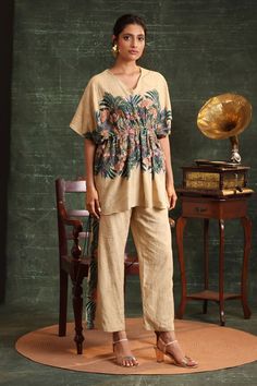 Beige cinched waisted kaftan tunic with contrast floral garden prints, elevated with floral applique, sequins, beads embellishments. Paired with a pant with floral printed side seams. - Aza Fashions Bohemian Beige Floral Print Set, Kaftan Tunic, Pant For Women, Cotton Kaftan, Straight Fit Pants, Indian Wedding Wear, Beaded Neckline, Garden Print, Floral Garden