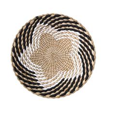 black and white braided placemats in the shape of a circle on a white background