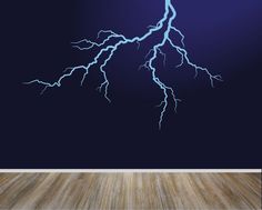 a room with a wooden floor and a lightning wall decal