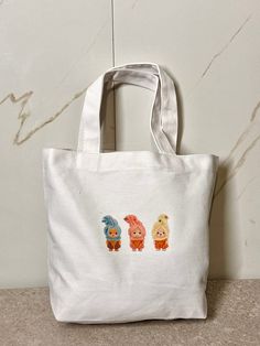 Cute Large Capacity Bags For Errands, Playful White Bag With Cute Design, Cute Large Capacity Canvas Pouch Bag, Trendy Everyday Bag With Cute Design, Trendy Everyday Bags With Cute Design, Casual Bags With Cute Design For Gift, Casual Bags Suitable As Gifts, Cute Rectangular Bag With Cartoon Print, Cute Rectangular Bags With Cartoon Print