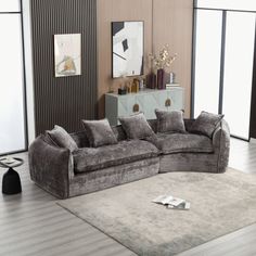 a living room filled with furniture and a rug