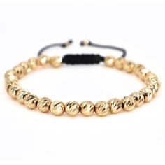 14K Solid Gold Bracelet, 6 mm Gold Bead Bracelet, Diamond Cut Gold Bracelet, Italian Gold Bracelet, Real Gold Bracelet, Perfect Gift for Men ✨This luxurious bracelet is handcrafted with 28 lustrous 6 mm diamond-cut beads and two delicate 2.5 mm beads at the clasp, all made from solid Italian 14K gold. The total gold weight is an impressive 9.58 grams, elegantly strung on an adjustable cord. The diamond-cut technique enhances the beads' surface, allowing them to sparkle brilliantly under any ligh Gold Beaded Braided Bracelet, Adjustable Yellow Gold Bracelet With Faceted Beads, Adjustable Yellow Gold Bracelets With 8mm Beads, Adjustable Yellow Gold Beaded Bracelets With Polished Beads, Gold Spiritual Wristband With Round Beads, Adjustable Spiritual Gold Bracelet With Round Beads, Gold Wristband With 8mm Beads, Gold Braided Bracelets With Jubilee Design And Round Beads, Adjustable Gold Wristband With Round Beads