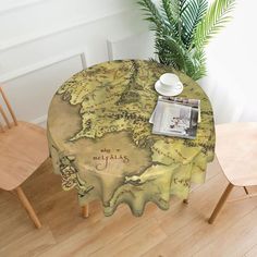 a table with a map on it and two chairs