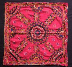 This is a beautiful embroidery from the Sindh area of Pakistan in silk on a fine cotton ground cloth.  The piece is decorated in small mirrors and fine stitches of multiple types.  The workmanship is of very high quality and hand done.  This can be used as a  wall hanging, a table cover or converted into a pillow.  The backing is an abolutely stunning cotton print fabric in a design of floral motifs and mythical animals and beings in bands. -Sindh embroidery-High quality workmanship-Great floral Handwork Embroidered Fabric For Ceremonial Festivals, Ceremonial Embroidered Fabric With Handwork For Festivals, Ceremonial Multicolor Embroidered Fabric With Handwork, Ceremonial Multicolor Embroidered Raw Silk Fabric, Traditional Handwork Embroidered Silk Fabric, Ceremonial Dupatta With Multicolor Embroidery And Handwork, Red Bohemian Dupatta With Handwork, Handwork Embroidered Multicolor Fabric For Festival, Handwork Multicolor Embroidered Fabric For Festival