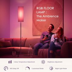 a man and woman sitting on a couch in front of a purple light that reads rgb floor lamp the ambience maker