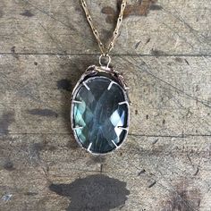 Let your inner Goddess shine through with this incredible rose cut labradorite set in sterling silver and brass. Anchored on our signature brass chain with a handmade clap. Pendant Length 1 7/8" Width 1" Chain Length 24" - 26" This piece is handmade-to-order, please allow 1 - 2 weeks to ship unless this piece is in stock. Each piece will vary slightly due to the uniqueness of the stones. All metal is nickel free. Elegant Electroformed Labradorite Jewelry, Silver Oval Electroformed Necklace, Faceted Silver Brass Jewelry, Hand Forged Oval Brass Jewelry, Goddess Pendant, Designer Handmade Jewellery, Inner Goddess, Jewelry Workshop, Cluster Necklace