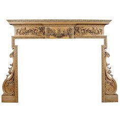 an ornate wooden fireplace surround with carvings